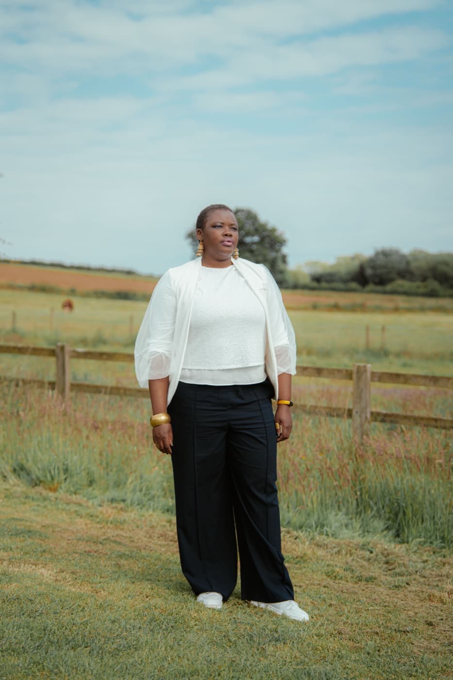 Cinematic portrait with farm background by a London photographer