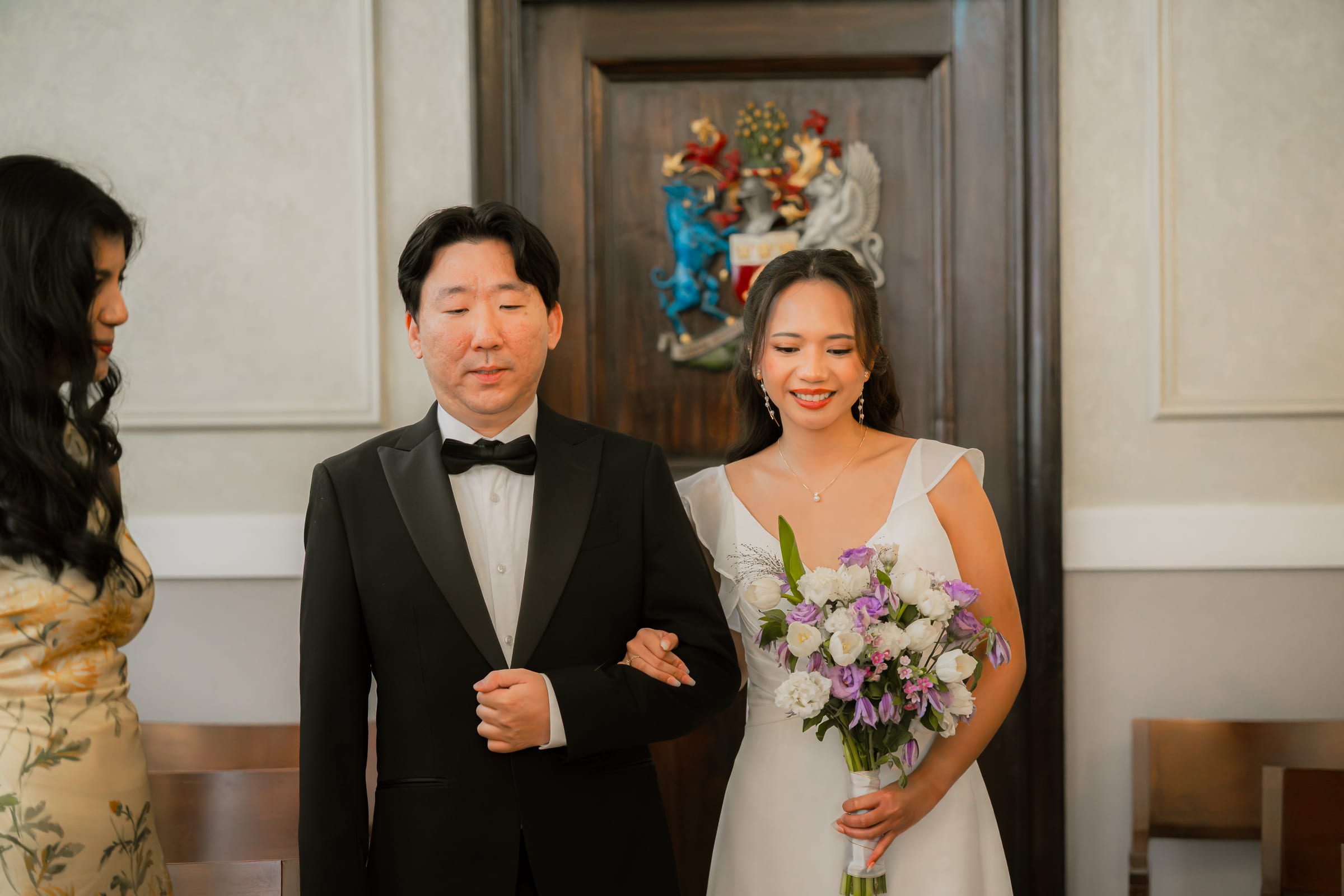 A couple during their wedding ceremony in the Brydon Room at Chelsea Old Town Hall