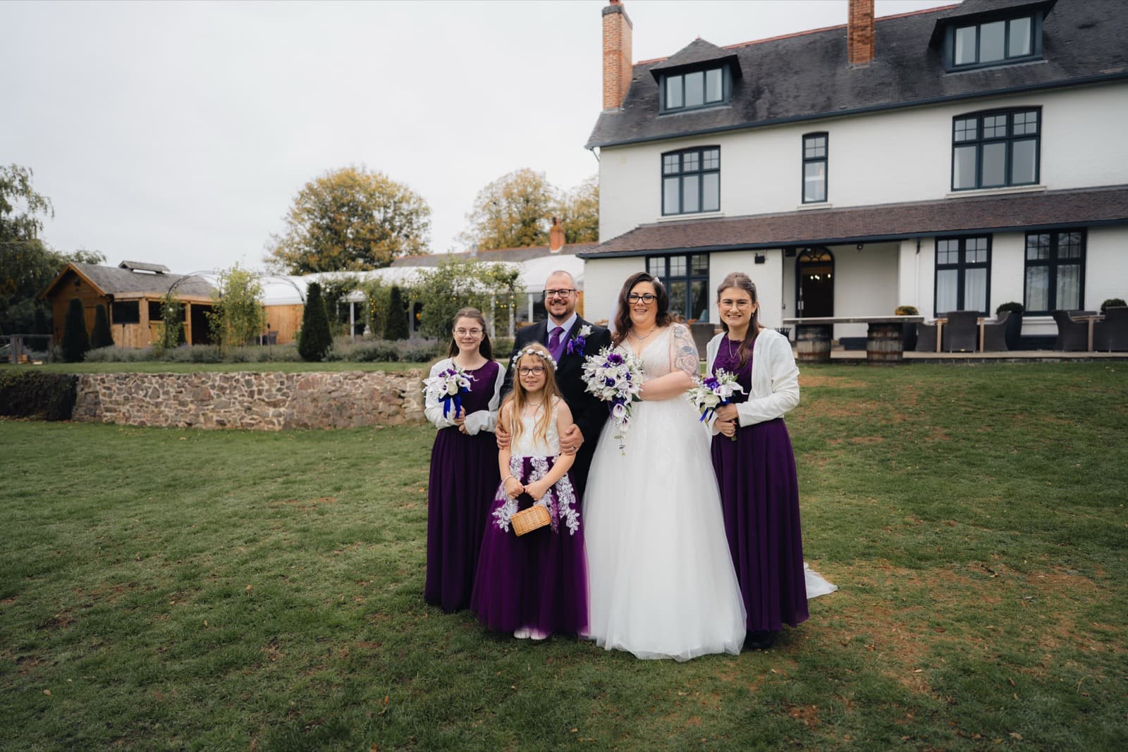 Bridal party in front of Ashton Lodge Country House near Rugby
