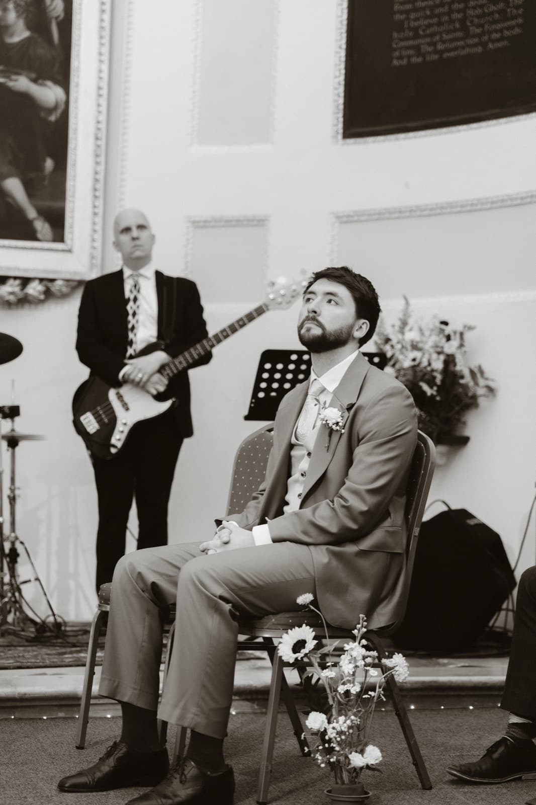 Black and white photograph of the groom during the ceremony in the City of London
