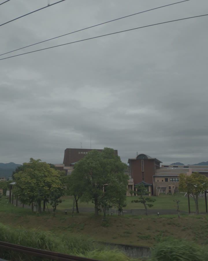 Japanese countryside passing by the train window