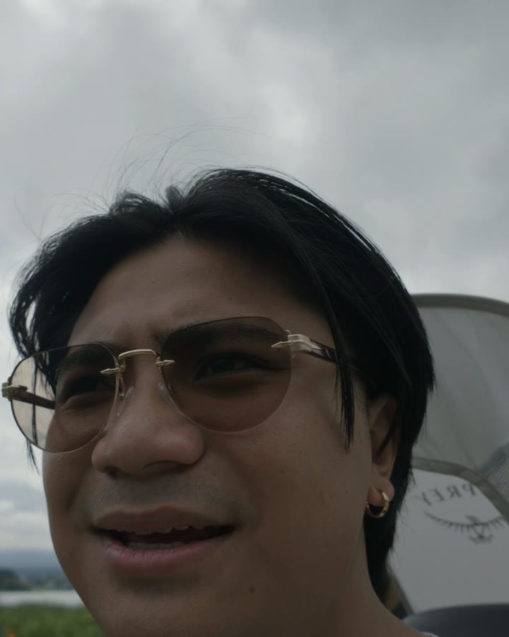 John chatting to the camera on a family walk in the hills in Japan