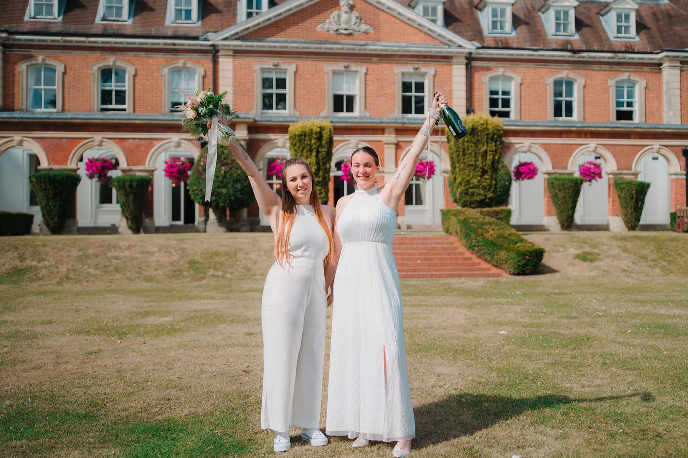 LGBT couple celebrating their marriage at a beautiful town hall — London